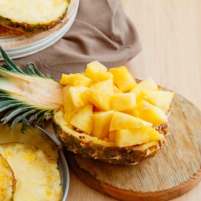 Chopped,Pineapple,Salad,In,Half,Pineapple.,Fresh,Delicious,Pineapple,Cut